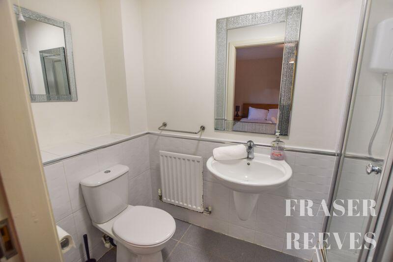 EN-SUITE SHOWER ROOM