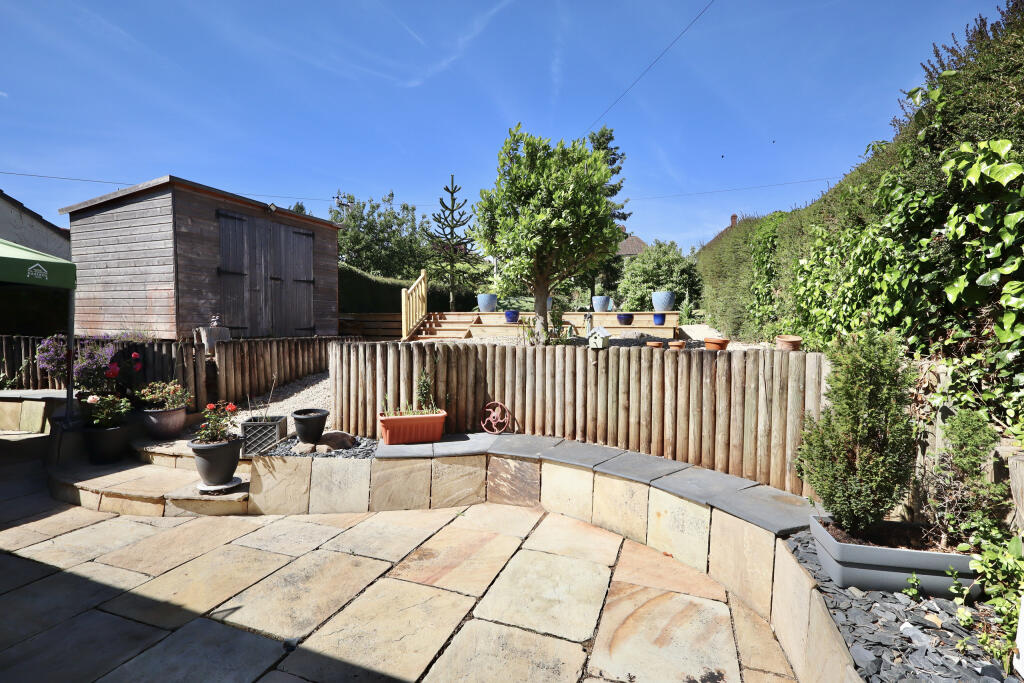 Rear patio leading to garden