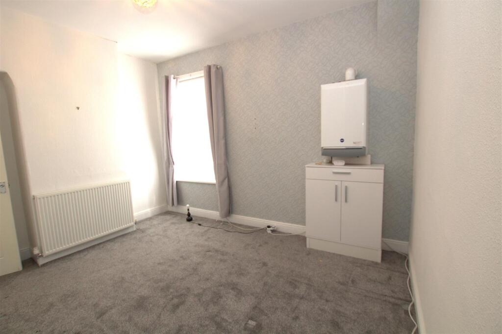 REAR BEDROOM ANGLE 2.jpg