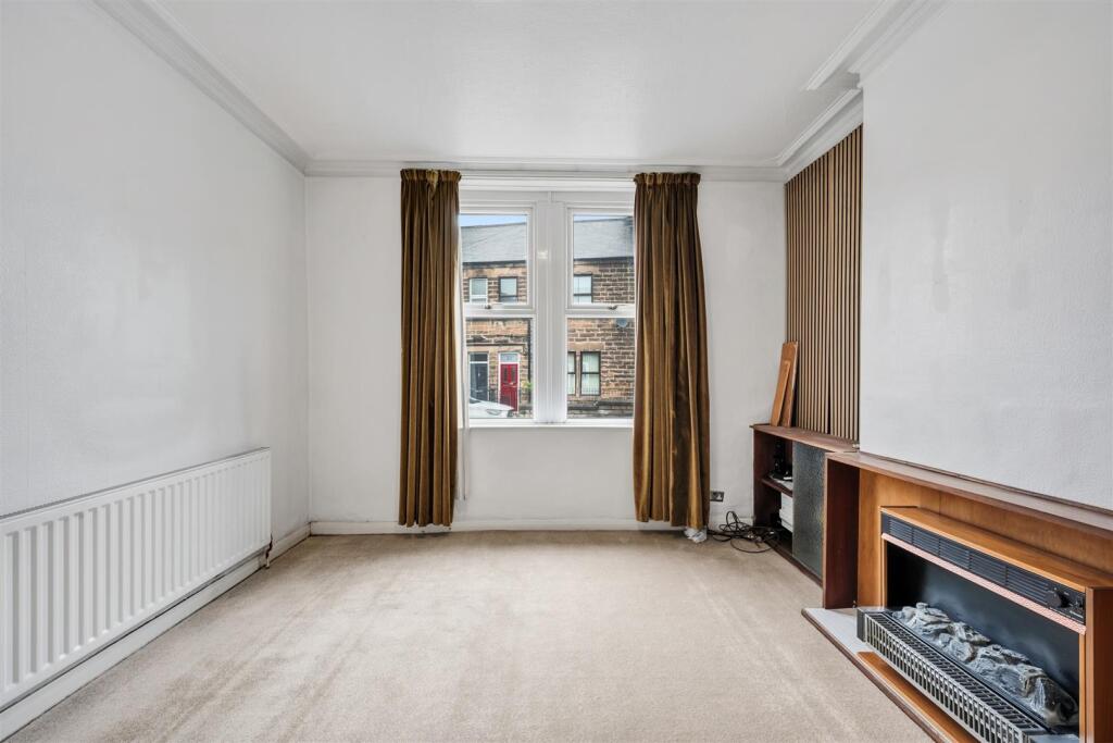 Sitting Room - window and fireplace.jpg