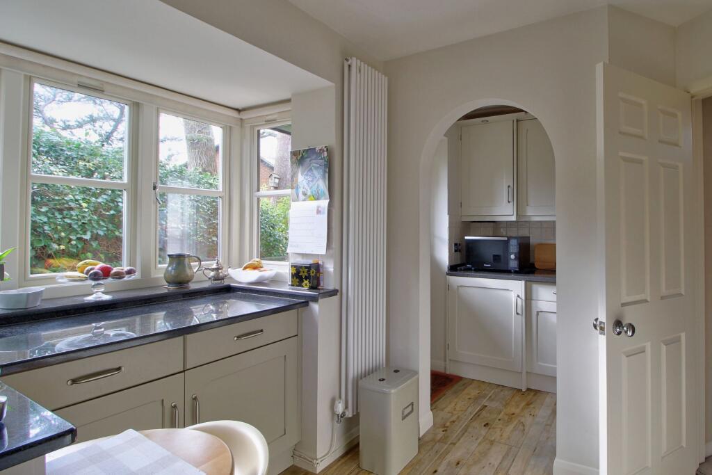 Showing utility (which has door to garden)