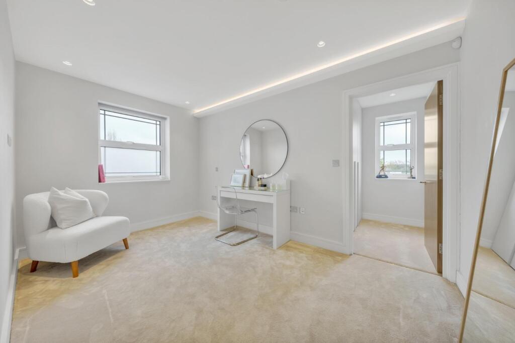 bedroom 2 dressing room.jpg