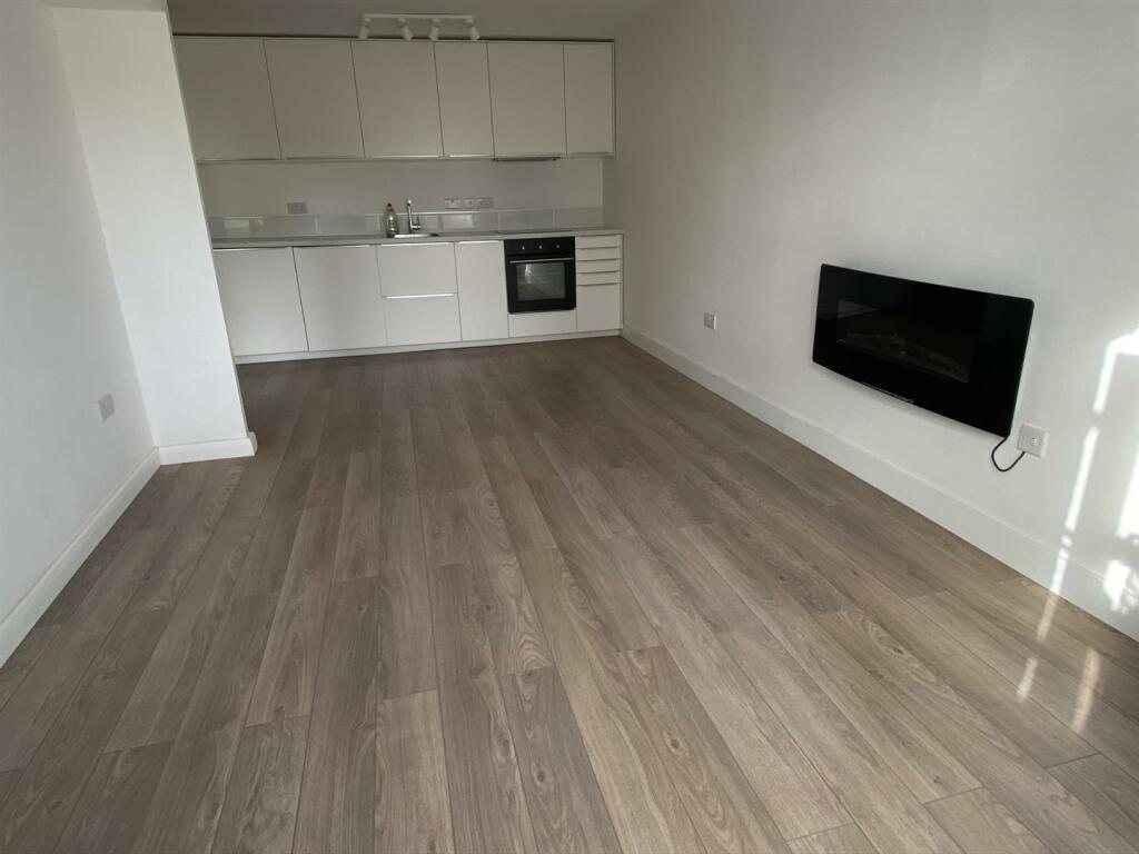 Open plan entrance, lounge and kitchen