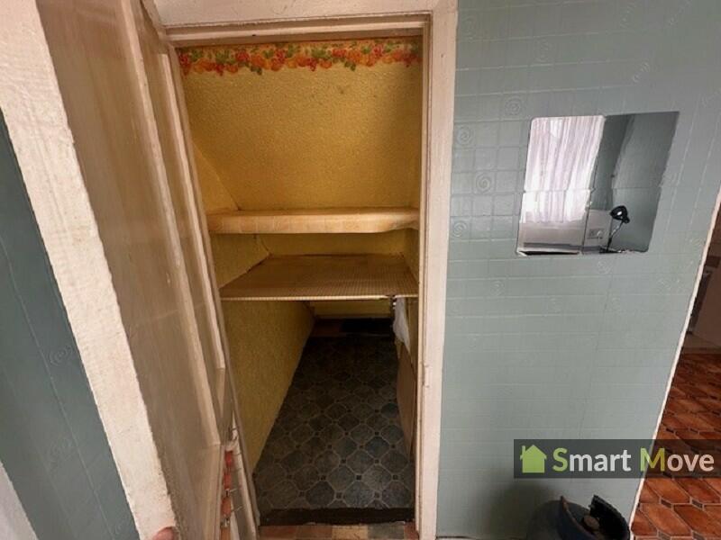 Understairs storage cupboard