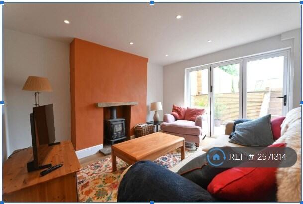 Downstairs Sitting Room, Fireplace And Garden Door