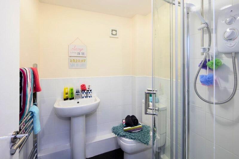 A neat and well-maintained bathroom featuring a...