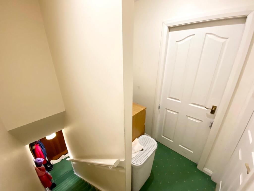 TO THE FIRST FLOOR LANDING