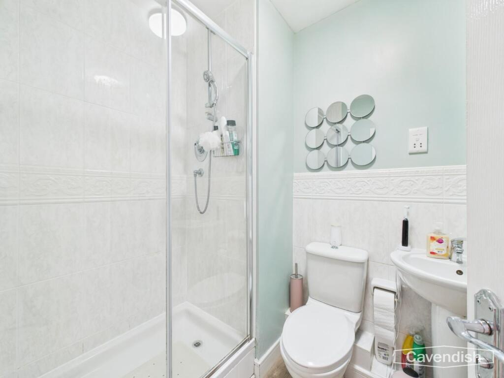 EN-SUITE SHOWER ROOM