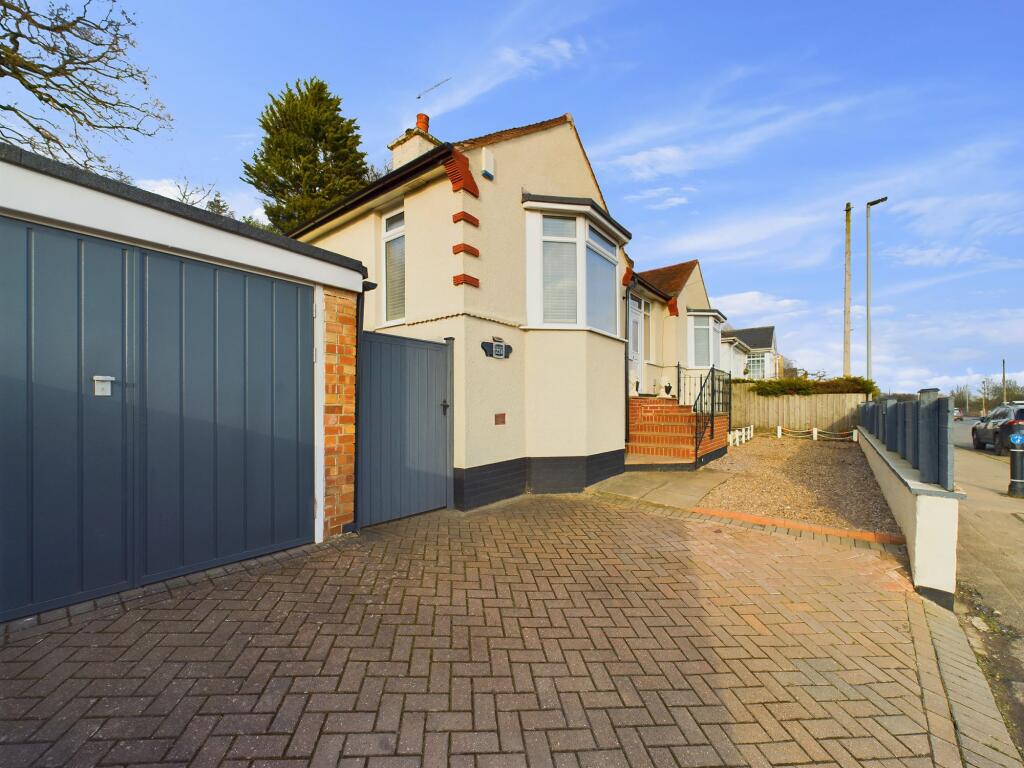 Front, Garage and Driveway