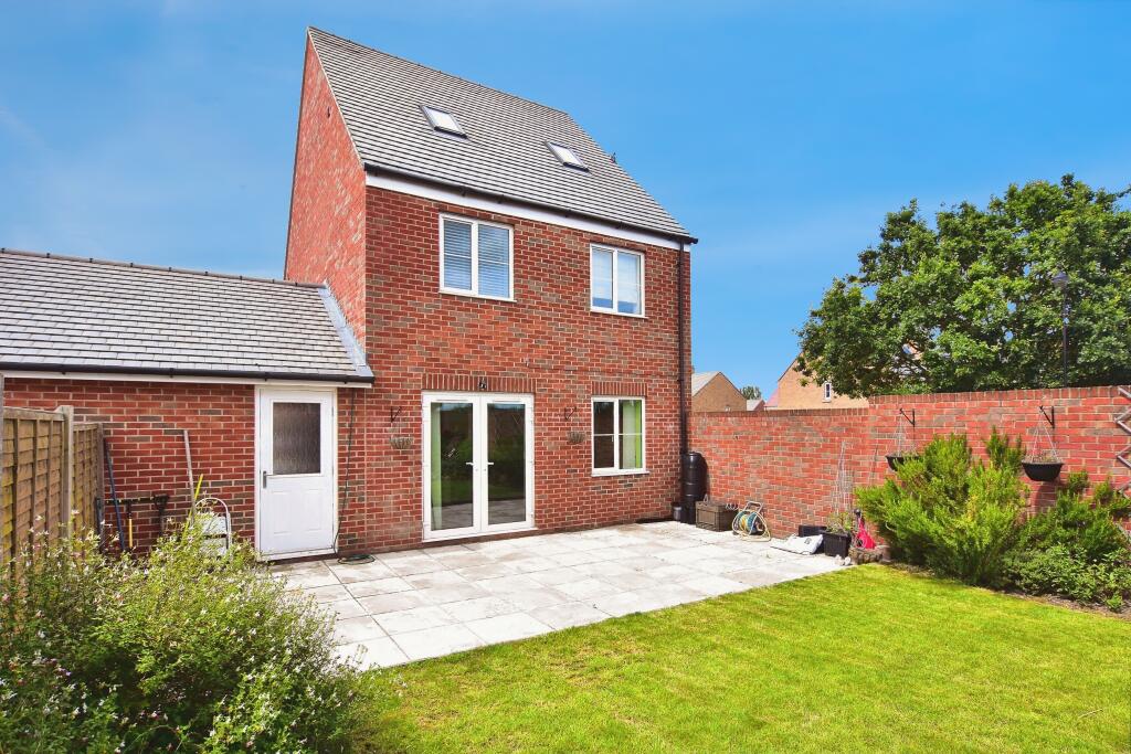 Back View Of The Garden &amp; Garage Entrance