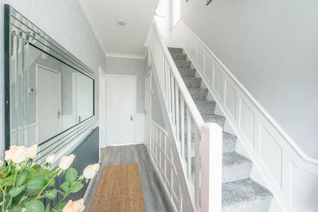 DOWN STAIRS W.C HALLWAY AND LANDING