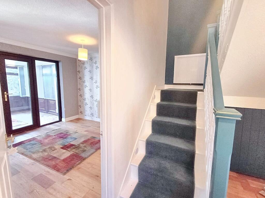 Hall, stairs into Living room