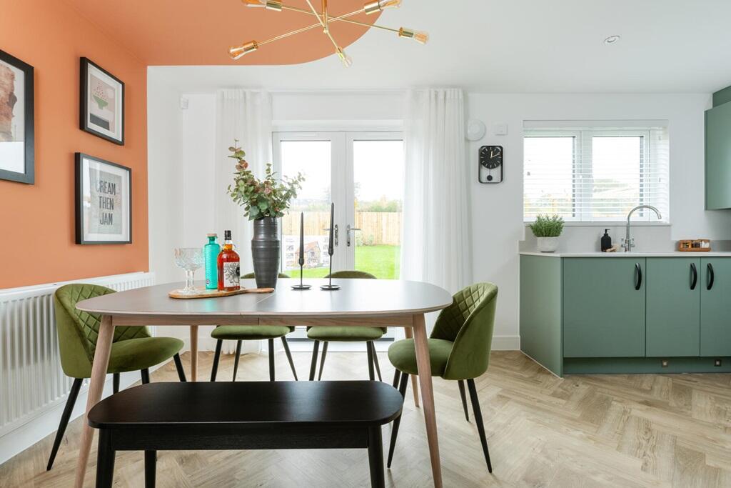 Double doors lead from the dining area to the garden, perfect for alfresco dining