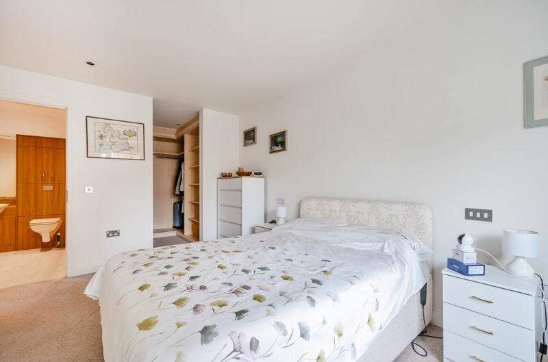 Master bedroom with dressing room and...