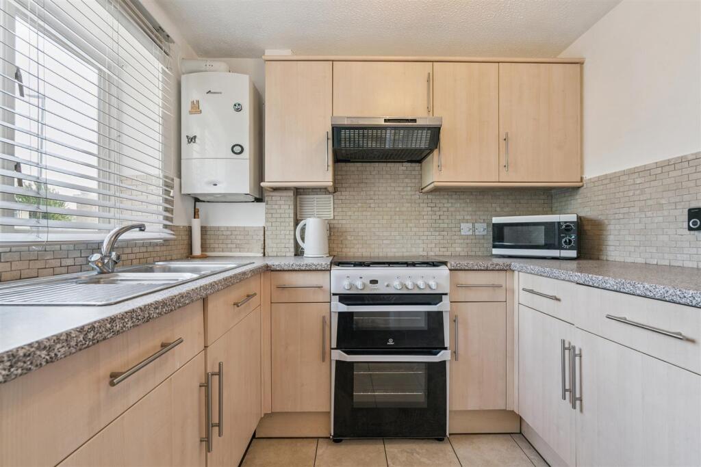 147 Sutton Common Road kitchen.jpg