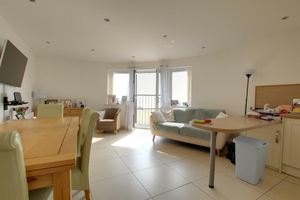 LIVING ROOM WITH KITCHEN AREA
