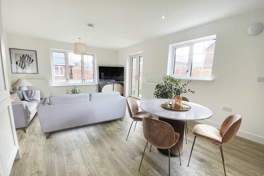Open plan layout with French doors to the rear garden