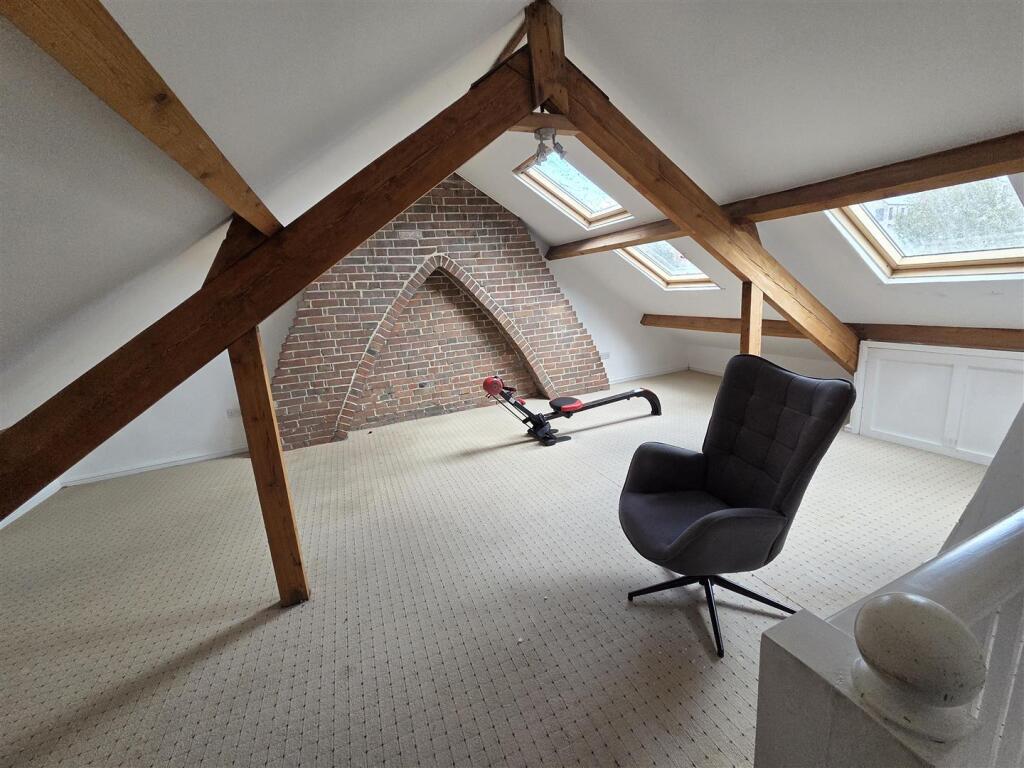 BEDROOM ONE/ATTIC ROOM