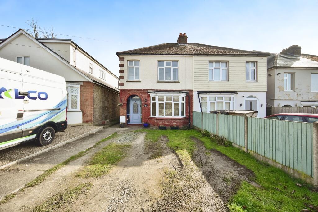 Front View Of The Property With Driveway Parking
