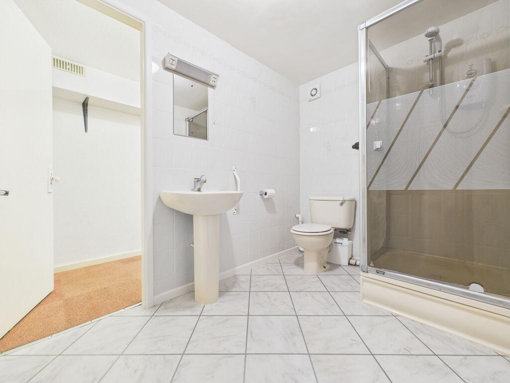 En-Suite through to Storage Room