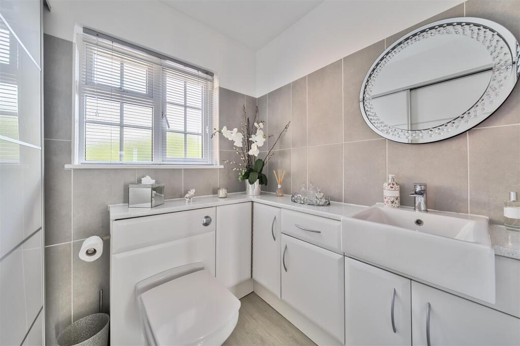 Utility Room/Guest Cloakroom (potential third bath