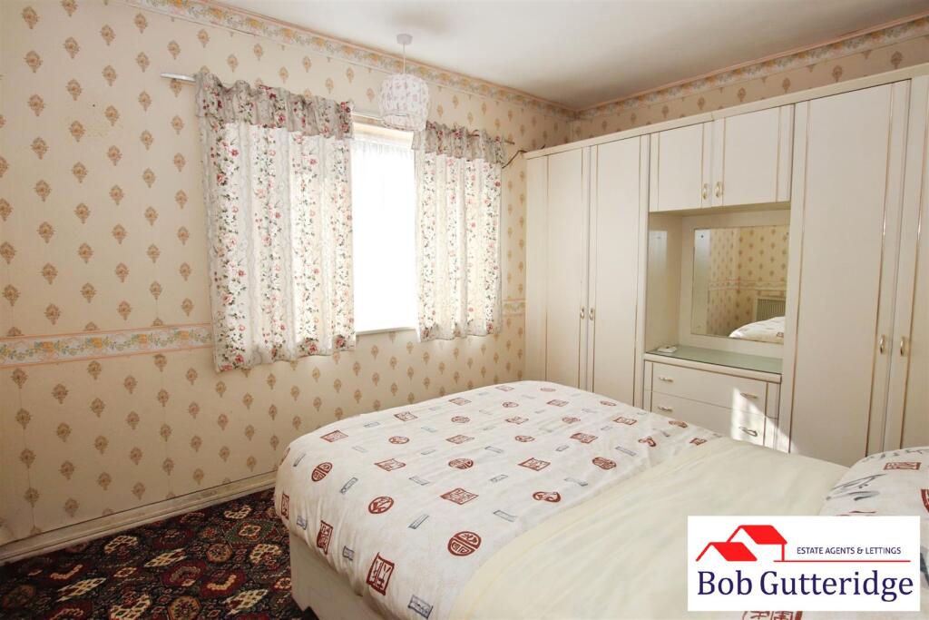 BEDROOM ONE (REAR)