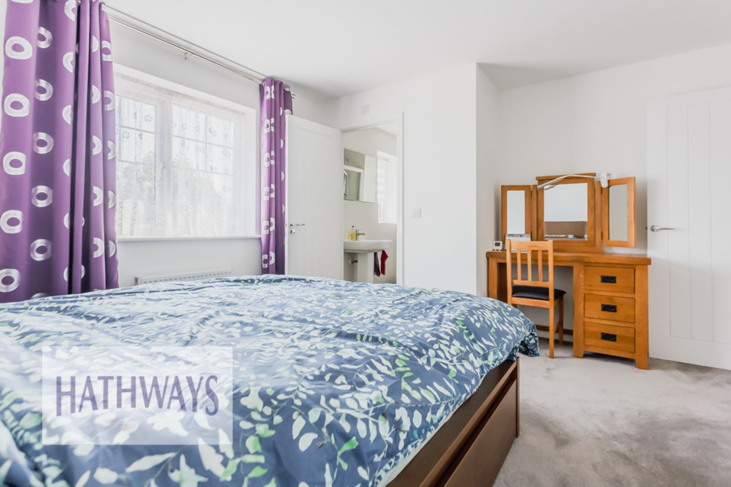 Master bedroom with a built-in wardrobe