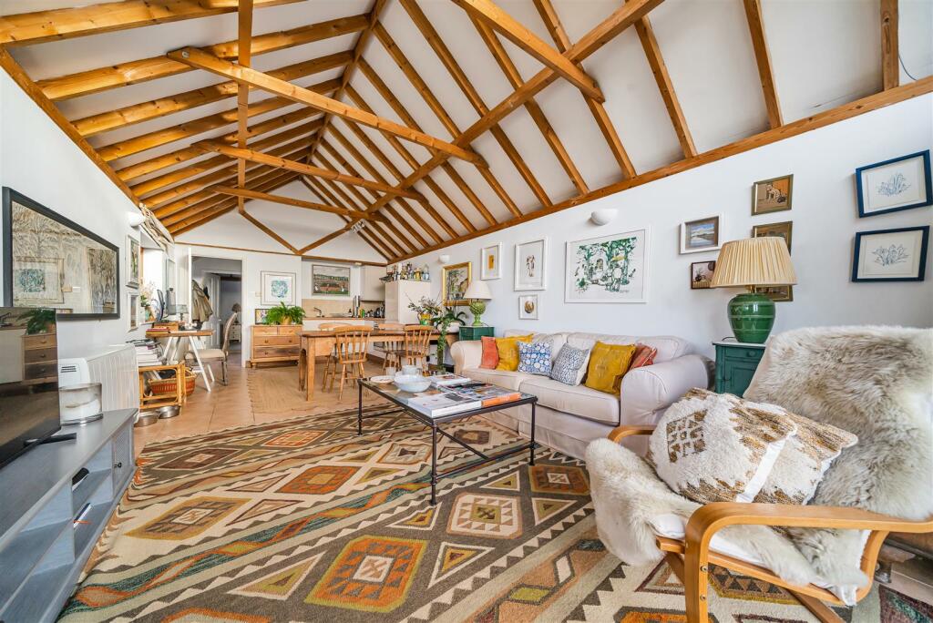 Sitting room and kitchen area.jpg