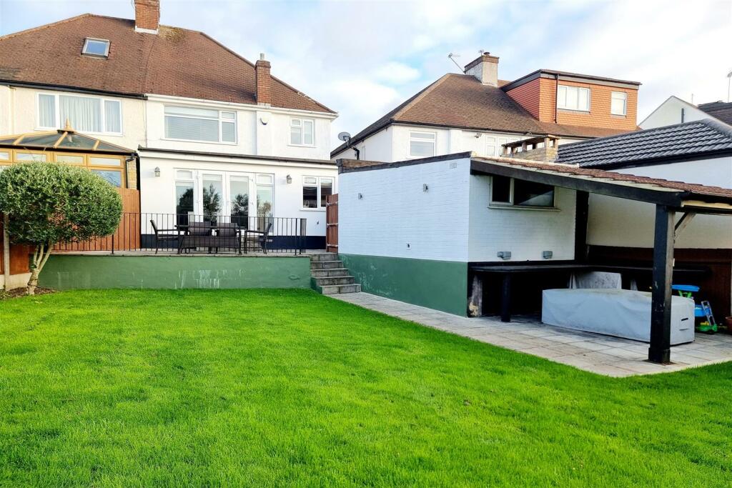 REAR ELEVATION OF PROPERTY: PIC. 1