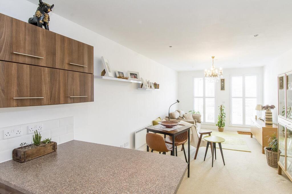 (Kitchen / Living Area Photo)