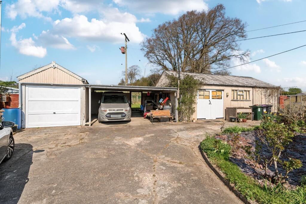 Driveway with garage and car port.jpg