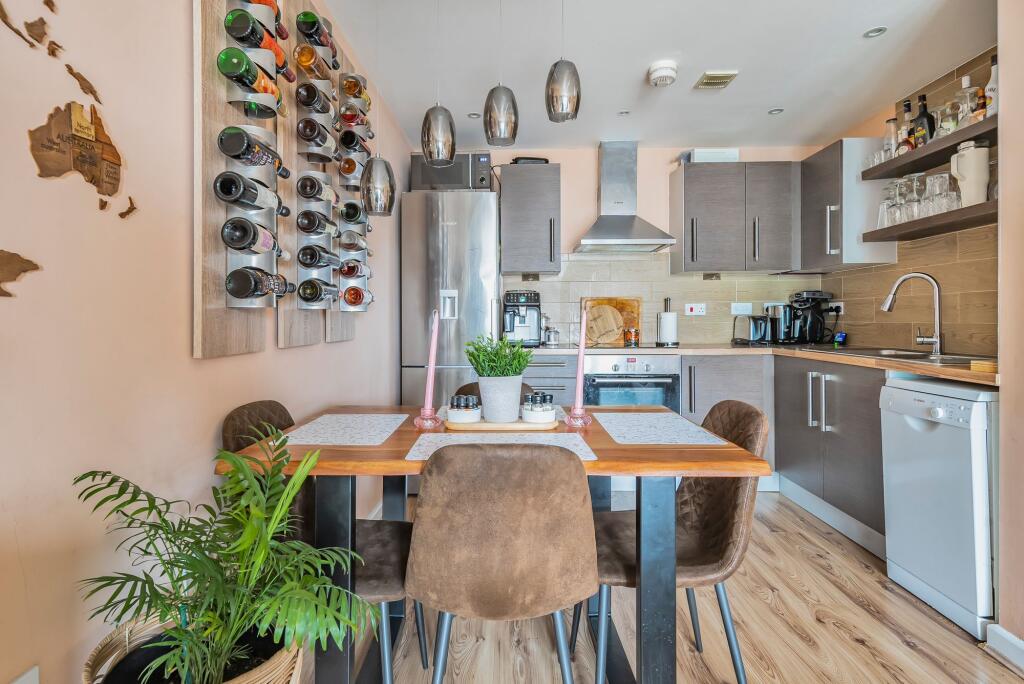 Open plan living space with balcony