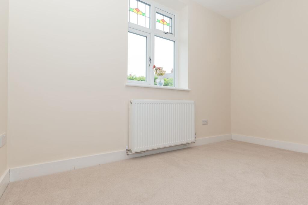 Four double bedrooms and two bathrooms
