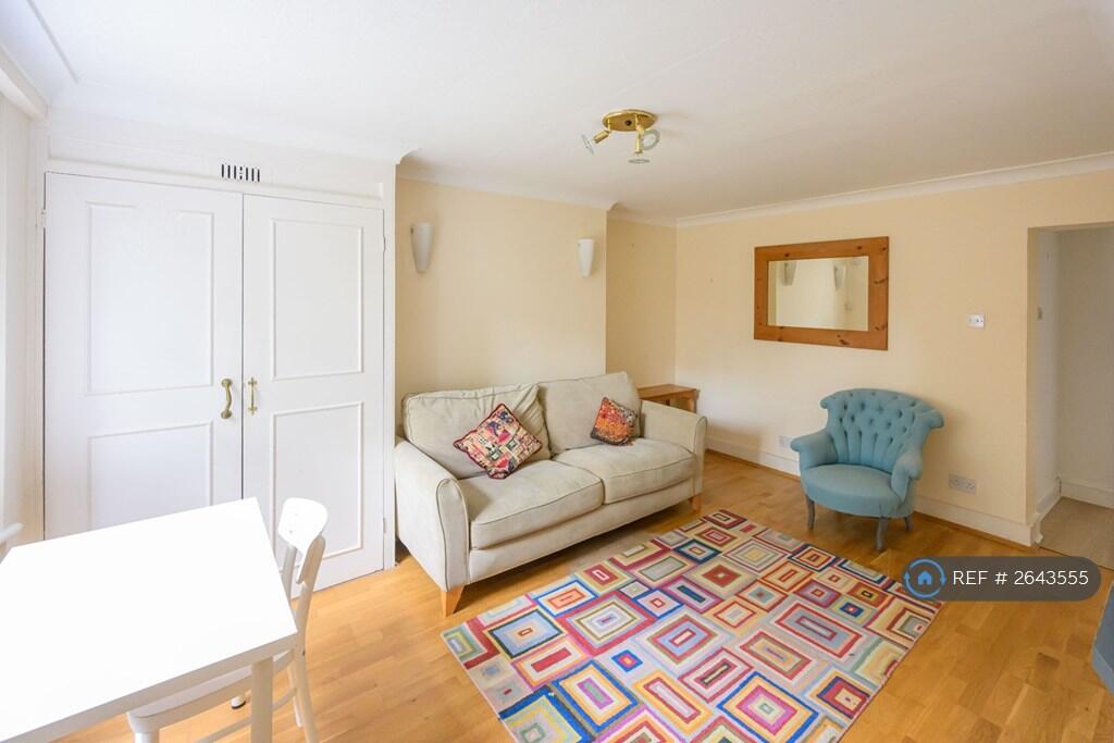 Open Plan Sitting Room With Kitchen