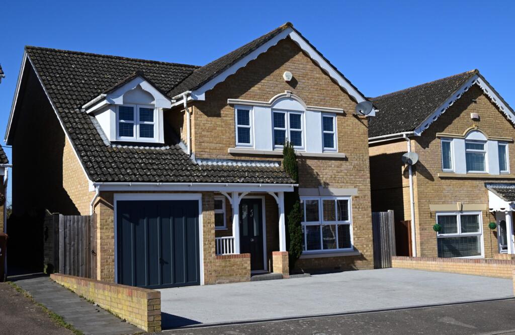 Outside View Of The Property With Driveway Parking