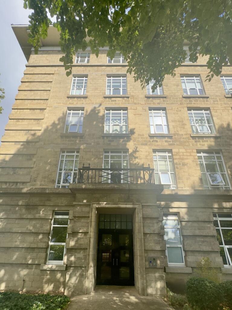 A charming multi-story terraced building with c...