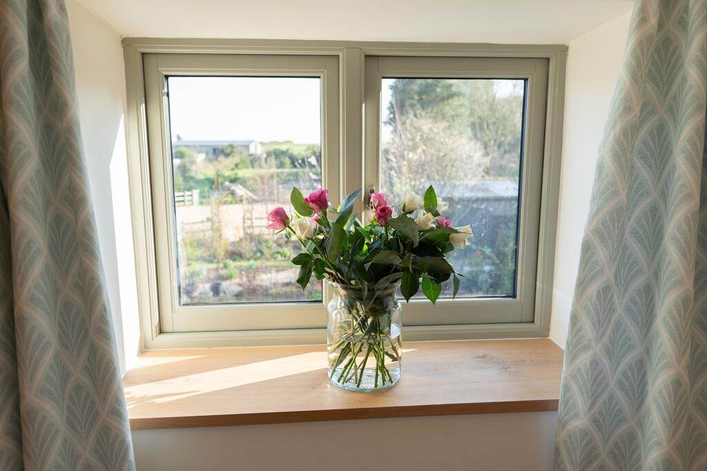 Deep windows with views onto the garden