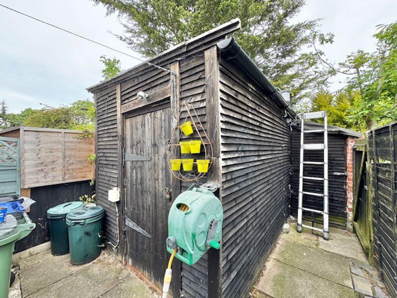 Timber shed and service area