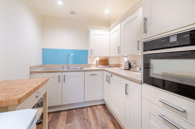 Kitchen with built-in appliances