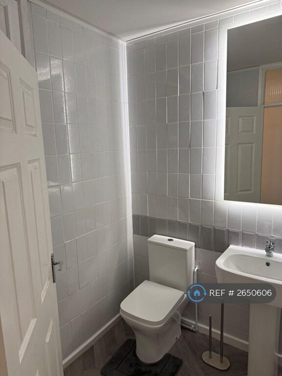 Bathroom With New Toilet And Sink