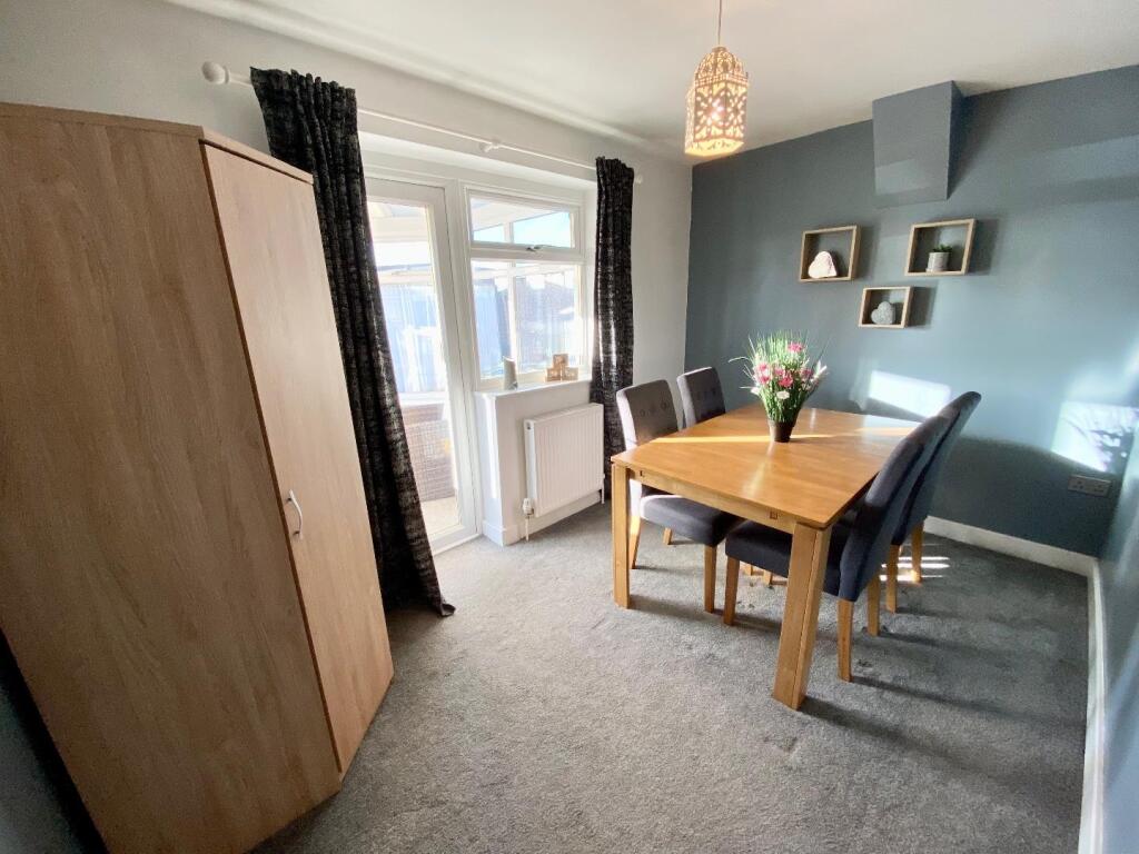 BEDROOM THREE/ DINING