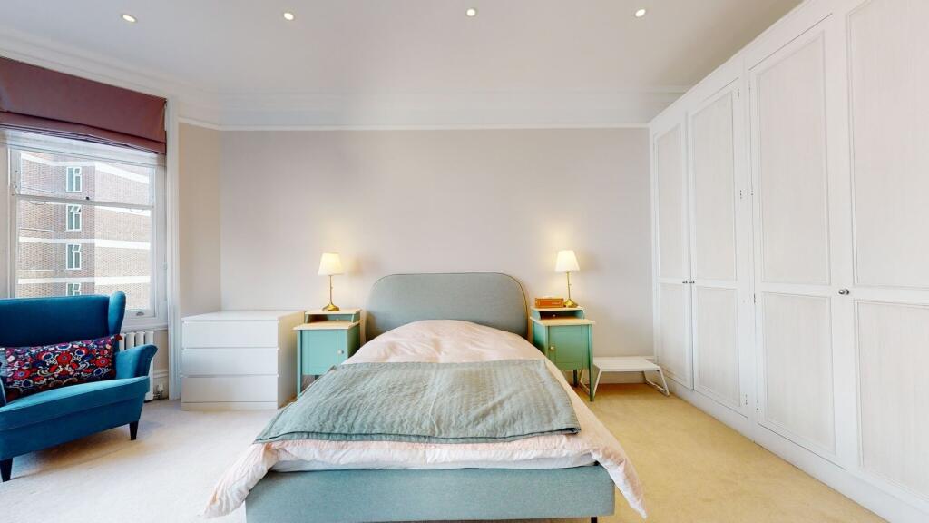Bright and airy double bedroom featuring a comf...