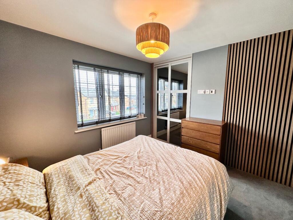 PRIMARY BEDROOM ONE