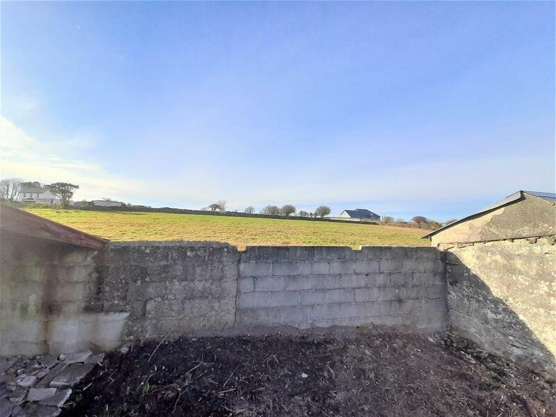 Open Fields to Rear