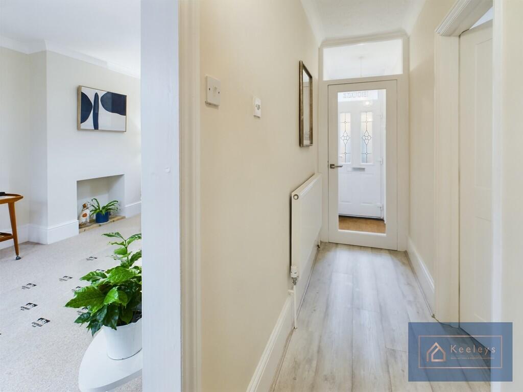 Hallway to front ...
