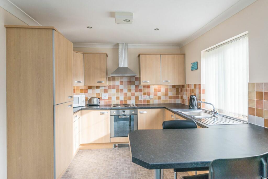 Sitting room and kitchen