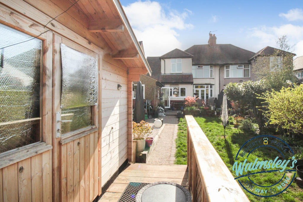 Rear gardens with insulated garden cabin