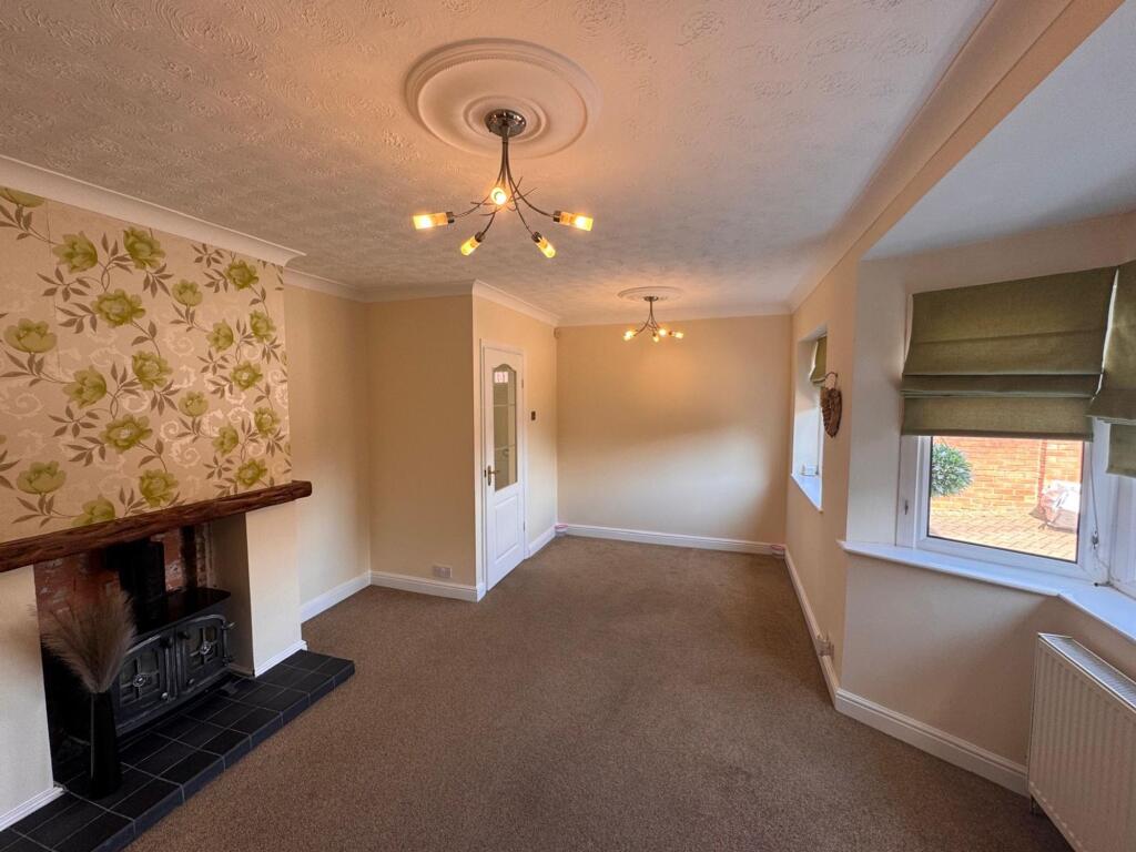 SITTING ROOM KITCHEN AND CONSERVATORY