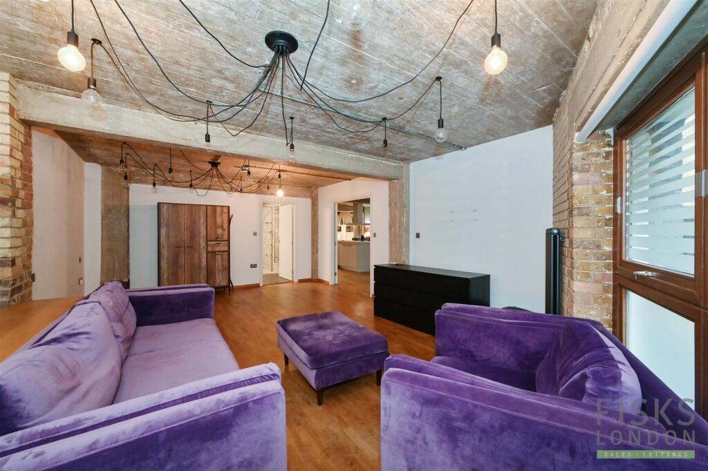 studio b purble sofa.jpg