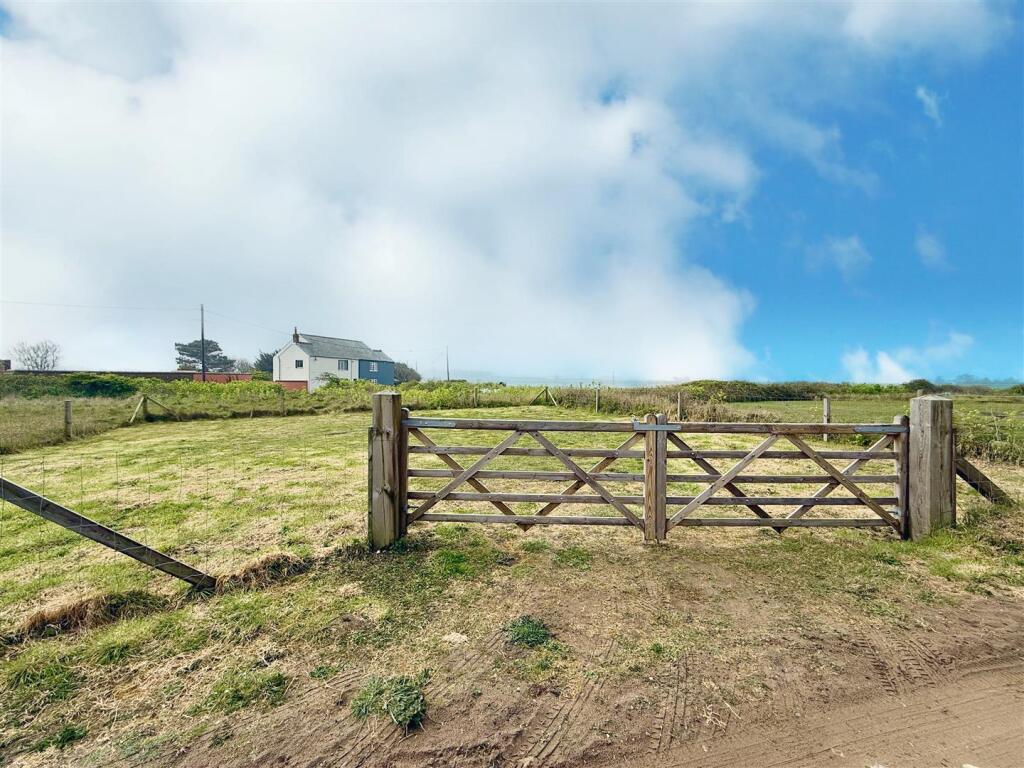 land across Beach Road
